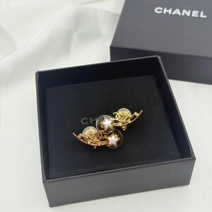 CHANEL Gold CC Ear Climber Earrings with White Enamel Stars